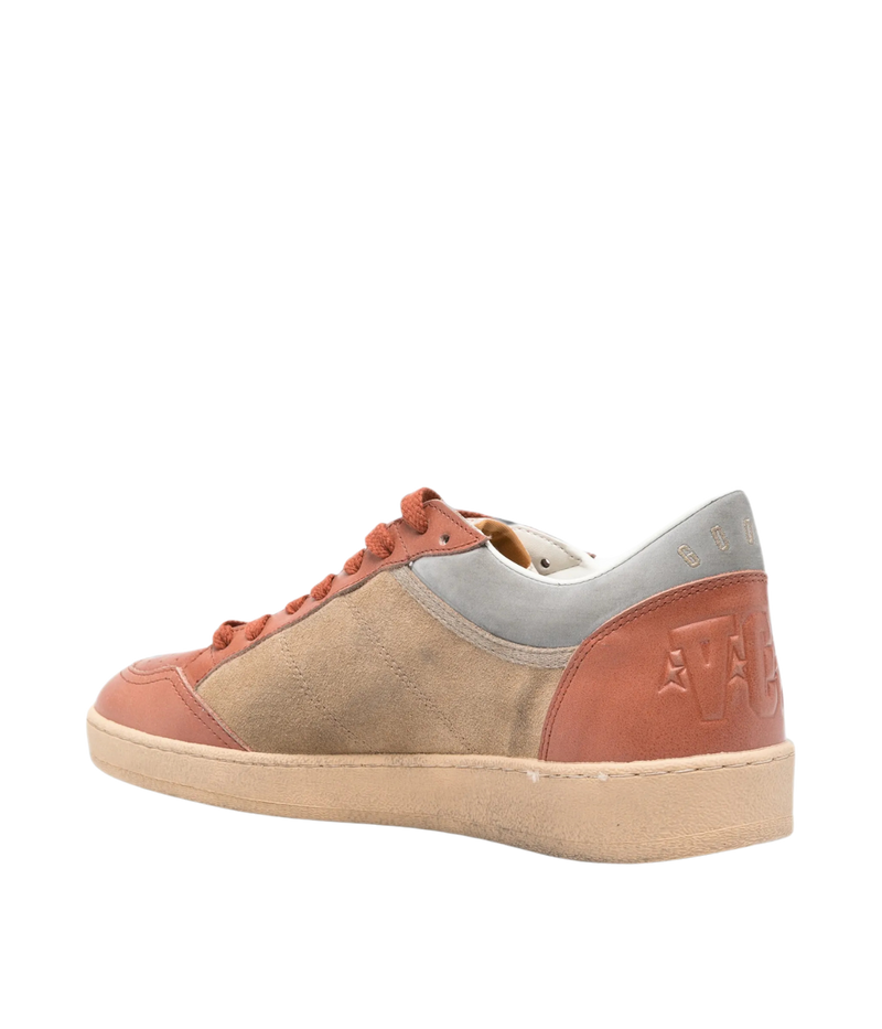 Golden Goose Ball Star low-top sneakers with a suede upper, leather toe and cream star in tobacco, brandy and beige tones, angled back profile.