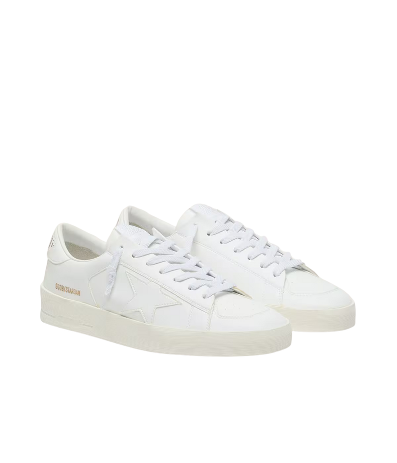 Golden Goose Stardan low-top sneakers in Optic White with a smooth leather upper and signature leather star, Angled side profile.
