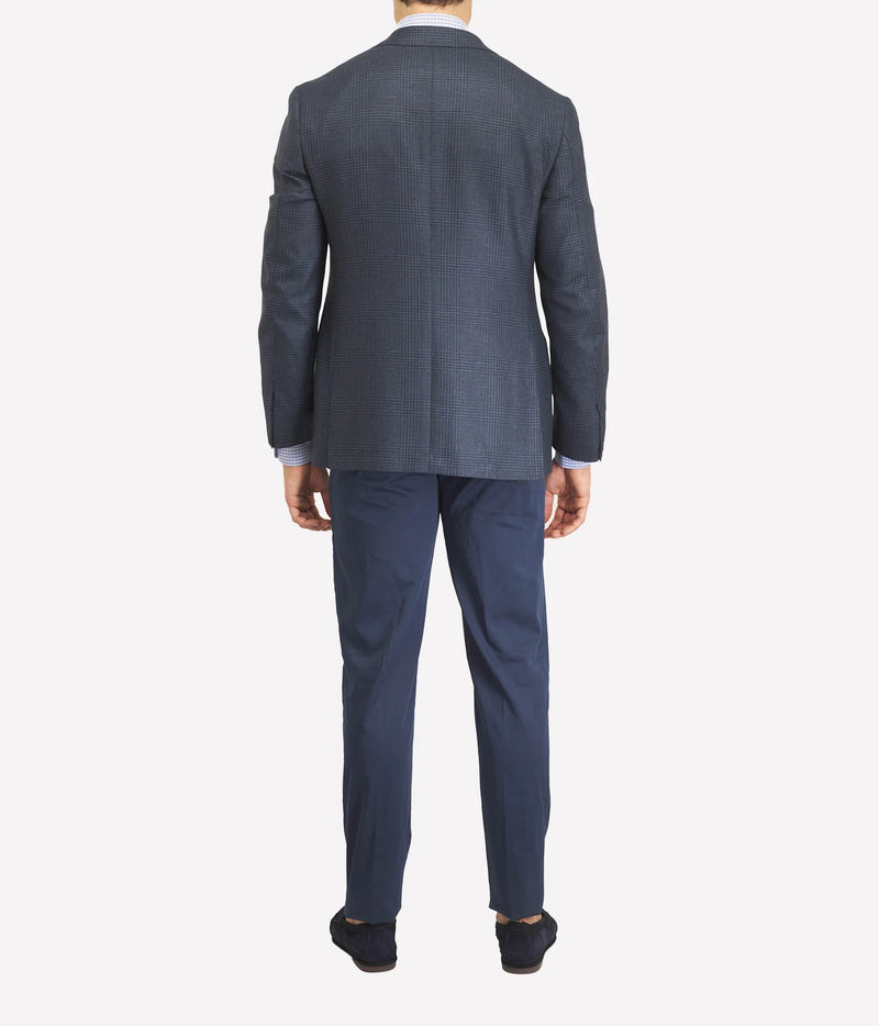 Man wearing Marco Pescarolo New York Cotton Silk Trouser in Navy with a grey blazer, back view