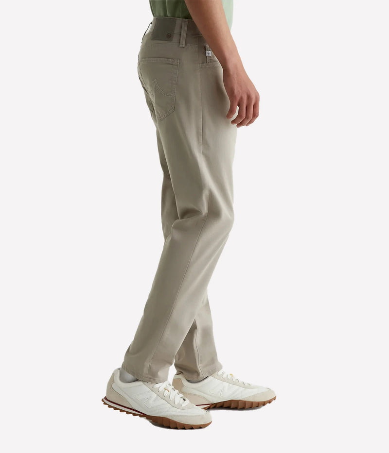 AG Tellis Jean Airluxe Dry Dust On Model Side View Modern Slim Performance Jean