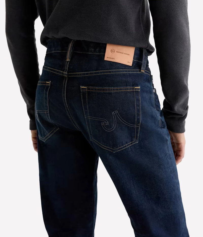 Close-up of AG Tellis Selvage Jean in 3 Years Out Of The Blue showing the back pockets and leather waistband patch