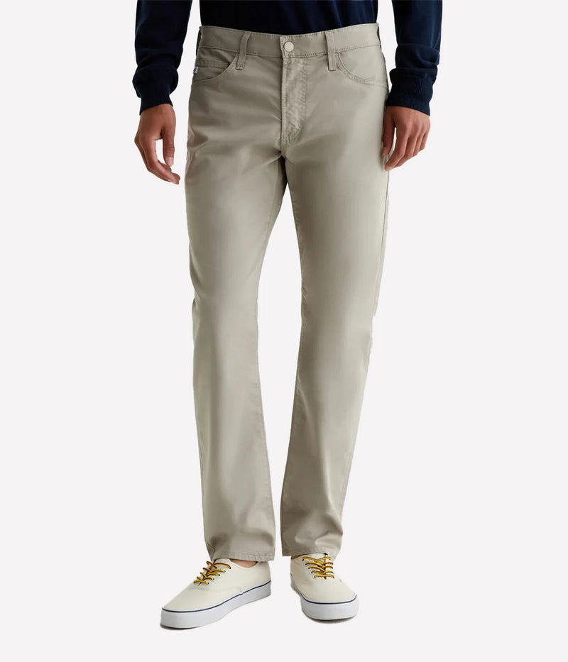 Everett Slim Straight Jeans, offering a relaxed yet refined fit with a slight taper at the leg. Crafted from lightweight, breathable Airluxe™ fabric and stretch-infused for comfort. Featuring five-pocket styling for a versatile look. Material: 53% Cotton, 44% Polyester, 3% Elastane. Made in USA.