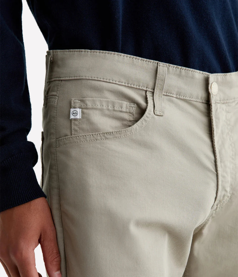 Everett Slim Straight Jeans, offering a relaxed yet refined fit with a slight taper at the leg. Crafted from lightweight, breathable Airluxe™ fabric and stretch-infused for comfort. Featuring five-pocket styling for a versatile look. Material: 53% Cotton, 44% Polyester, 3% Elastane. Made in USA.