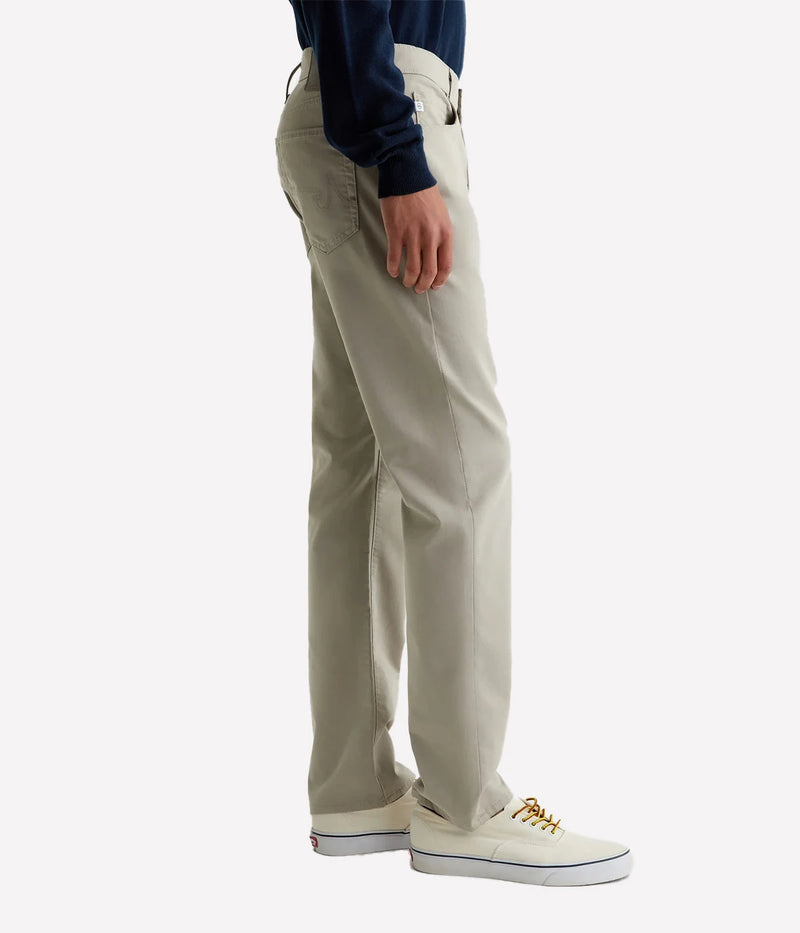 Everett Slim Straight Jeans, offering a relaxed yet refined fit with a slight taper at the leg. Crafted from lightweight, breathable Airluxe™ fabric and stretch-infused for comfort. Featuring five-pocket styling for a versatile look. Material: 53% Cotton, 44% Polyester, 3% Elastane. Made in USA.