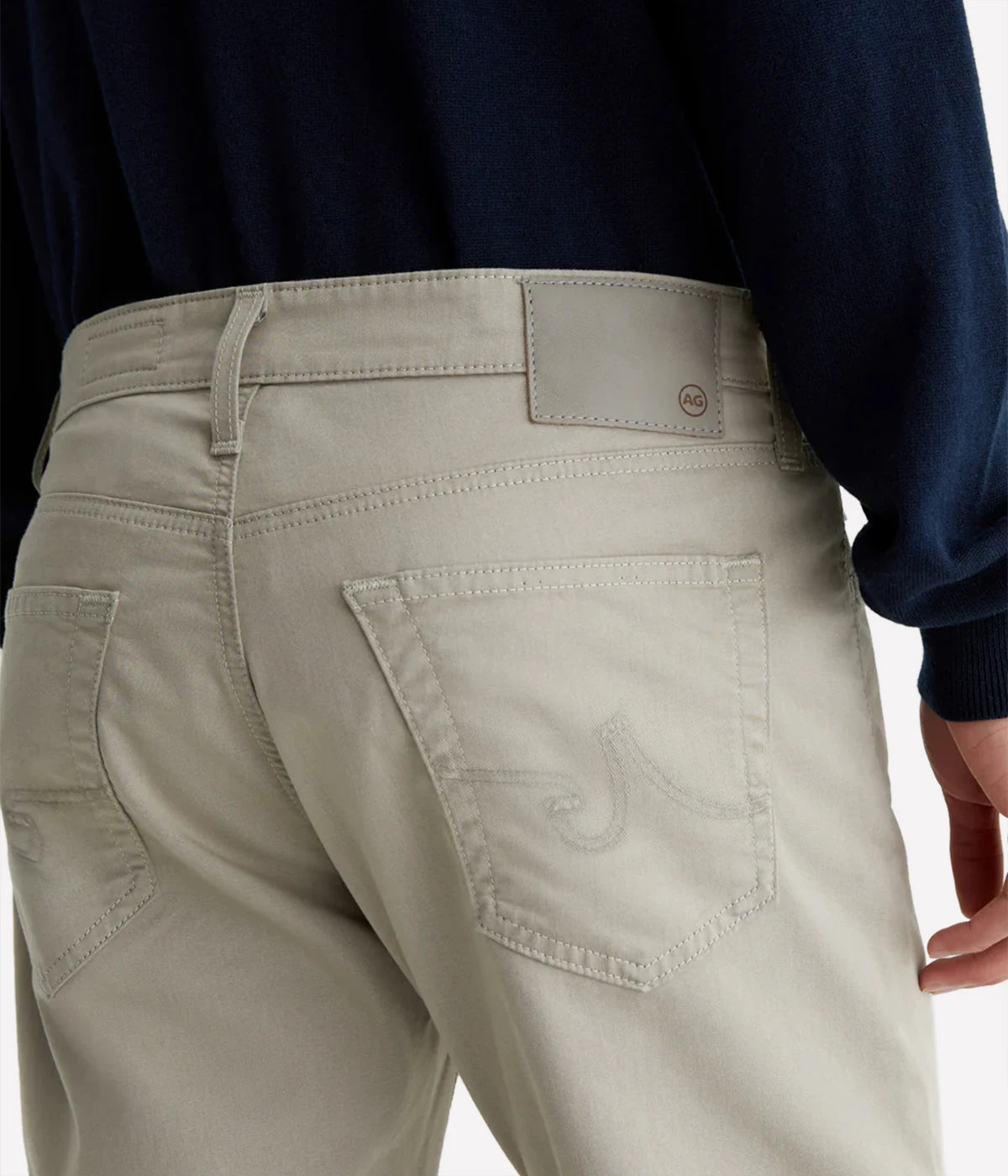 Everett Slim Straight Jeans, offering a relaxed yet refined fit with a slight taper at the leg. Crafted from lightweight, breathable Airluxe™ fabric and stretch-infused for comfort. Featuring five-pocket styling for a versatile look. Material: 53% Cotton, 44% Polyester, 3% Elastane. Made in USA.