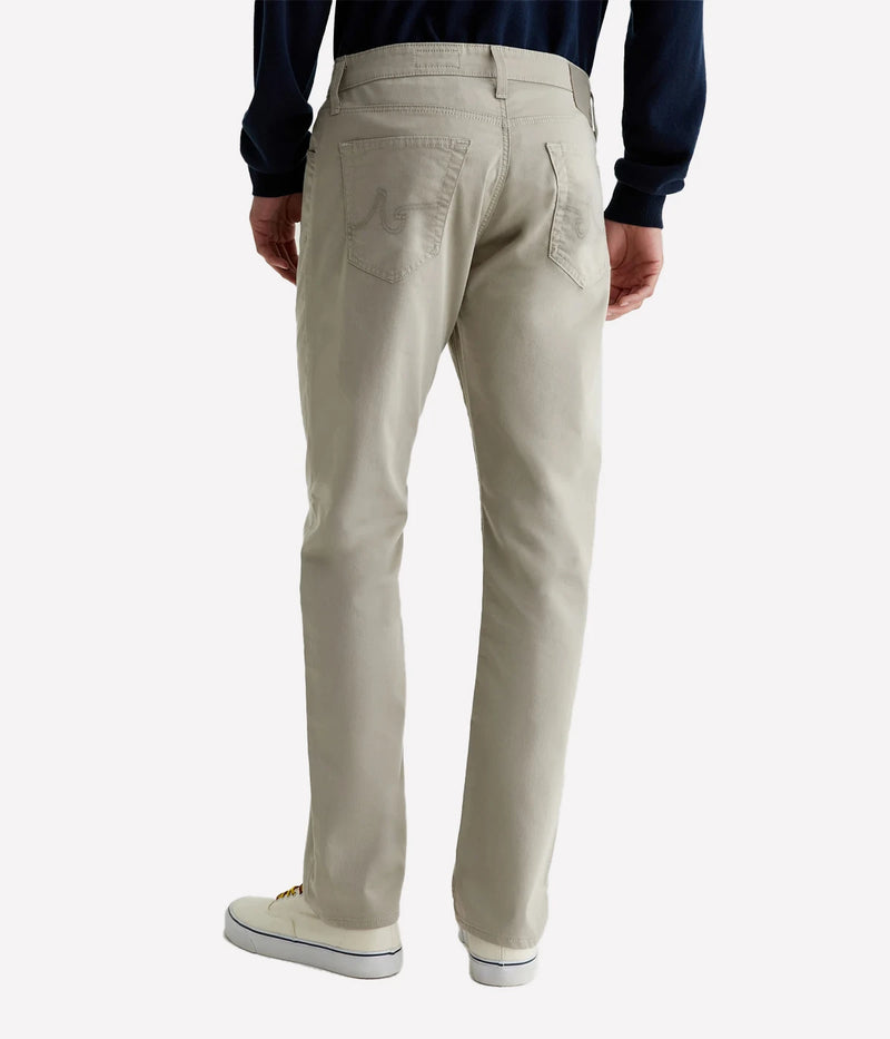 Everett Slim Straight Jeans, offering a relaxed yet refined fit with a slight taper at the leg. Crafted from lightweight, breathable Airluxe™ fabric and stretch-infused for comfort. Featuring five-pocket styling for a versatile look. Material: 53% Cotton, 44% Polyester, 3% Elastane. Made in USA.