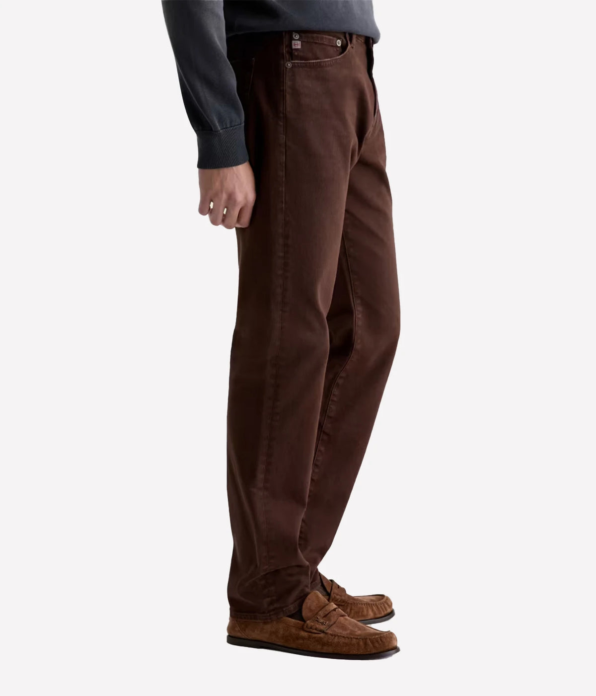 Man wearing AG Everett Jean in 7 Years Sulfur Wood Brown with brown shoes, side view