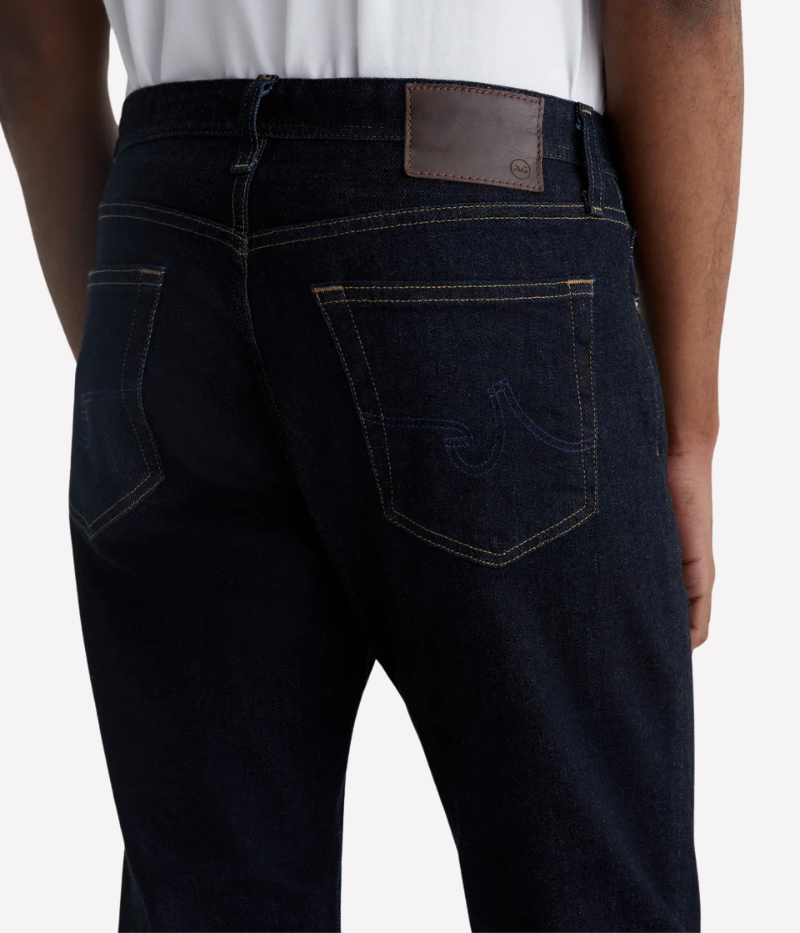 AG Everett slim straight jeans in deep indigo, featuring a mid-rise waist, tapered leg, and classic five-pocket design.