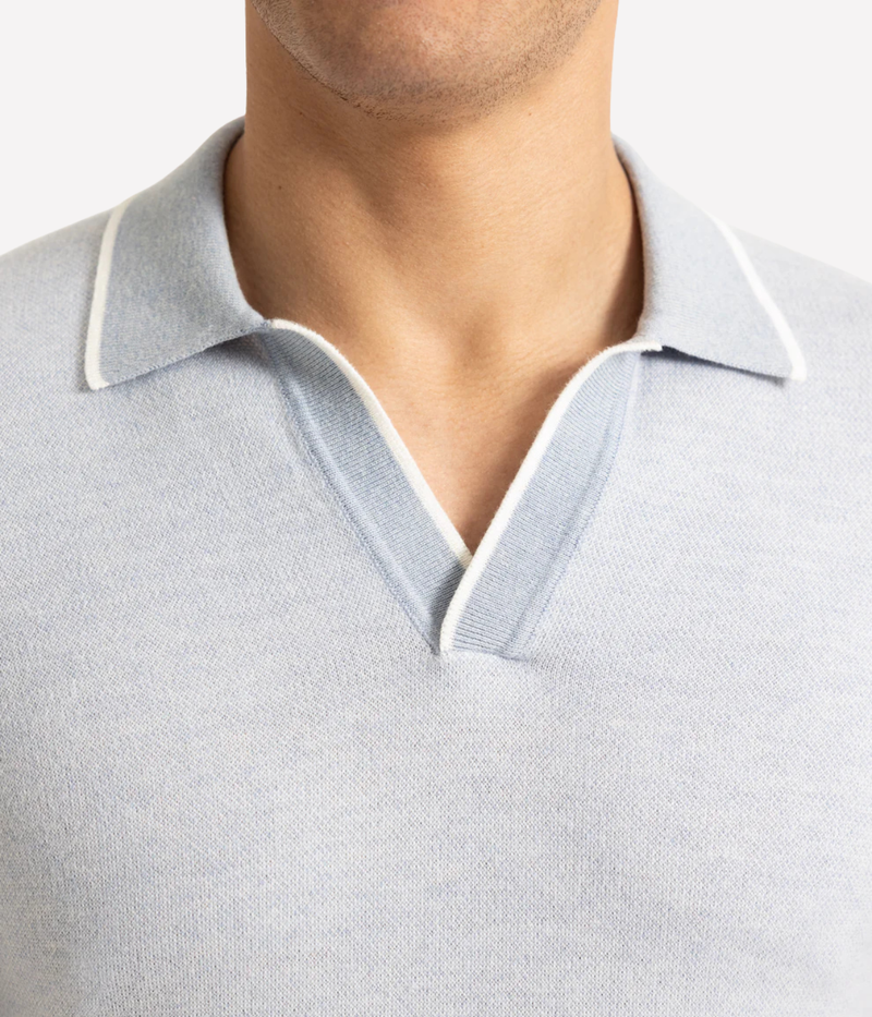 Orlebar Brown Horton Contrast Polo in Surfside Blue and White Sand with contrast tipping, open rib placket and tailored fit - Closeup Shot on Collar