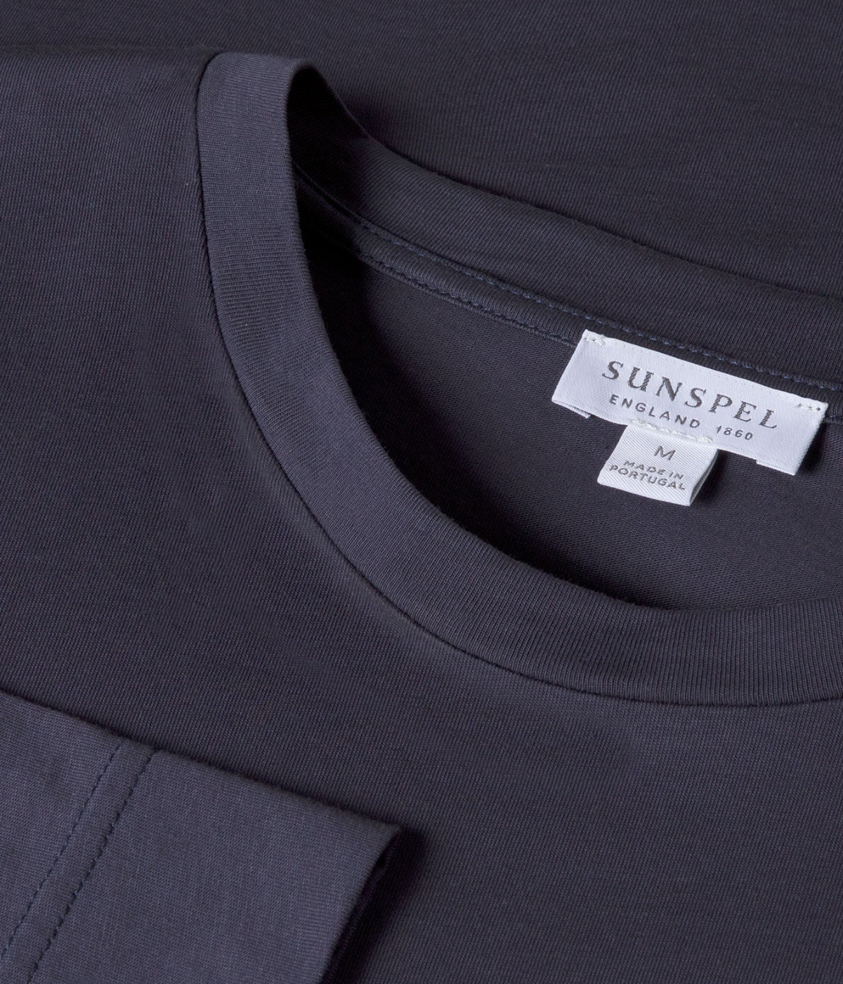 Sunspel Long Sleeve Riviera T-Shirt in Navy flat lay close-up of crew neckline and smooth Supima cotton texture