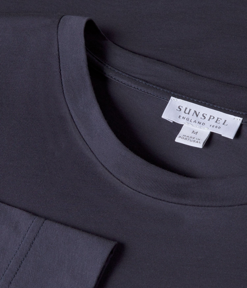 Sunspel Long Sleeve Riviera T-Shirt in Navy flat lay close-up of crew neckline and smooth Supima cotton texture