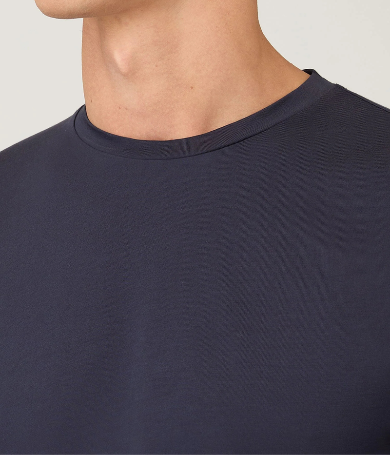 Sunspel Long Sleeve Riviera T-Shirt in Navy close-up on model showing crew neckline detail and smooth midweight Supima cotton fabric.