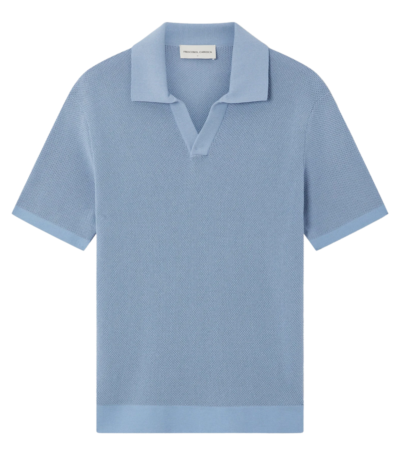 A Frescobol Carioca Rino Short Sleeve Cotton Polo in Light Denim Blue with a textured knit fabric, presented flat against a solid white background.