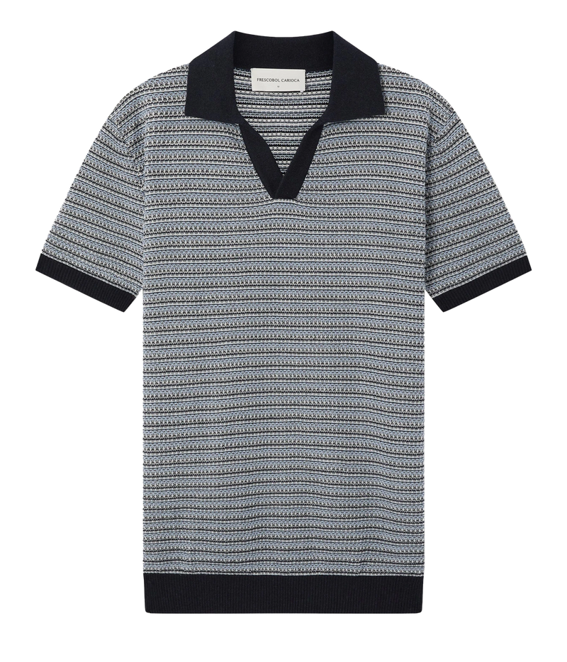 Frescobol Carioca Rino Short Sleeve Cotton Polo in Navy, featuring a navy, grey and navy geometric pattern, a solid navy V-neck collar, navy sleeve cuffs, and a black hem, shown on a plain white background.