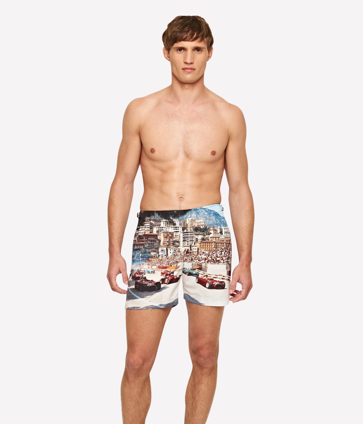 Orlebar Brown Classic Mid-Length Swim Shorts featuring a Formula 1 print of race cars at the start of the 1956 Grand Prix de Monaco, capturing the excitement of the iconic race.