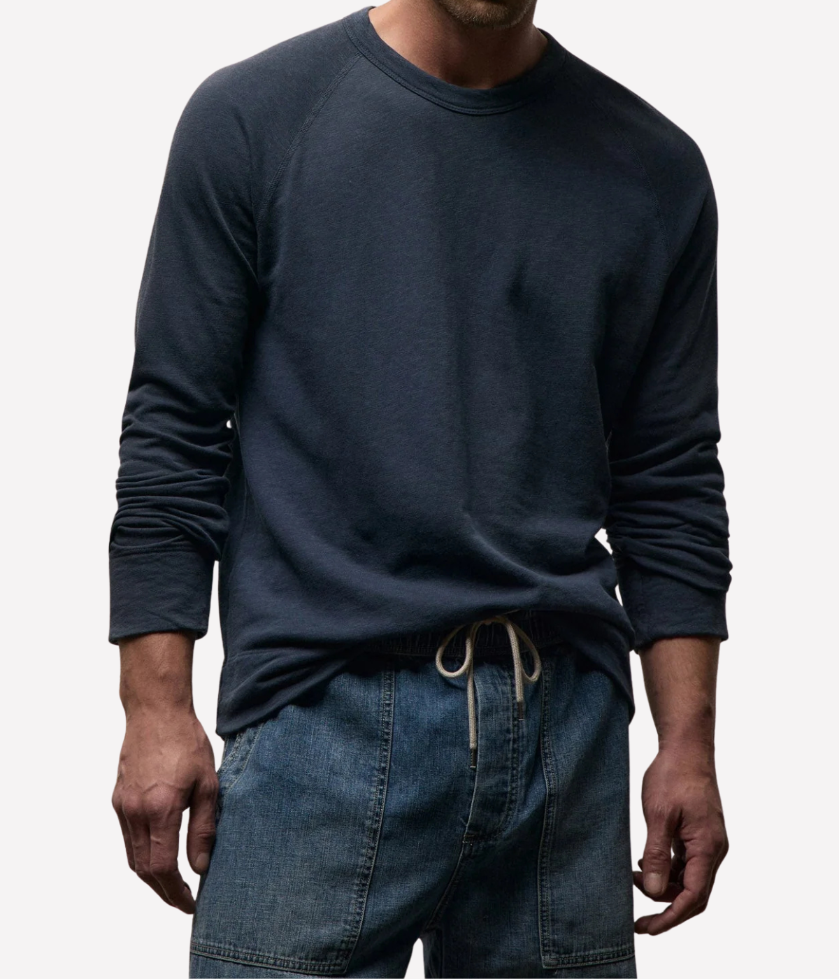 James Perse Vintage French Terry Sweatshirt in Deep – upper body view on model highlighting crew neckline, raglan sleeve construction, and soft cotton texture.
