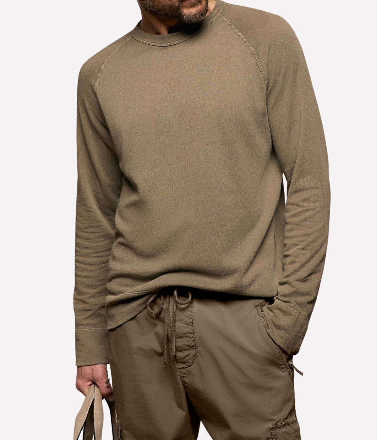 James Perse Vintage French Terry Sweatshirt in Light Olive Pigment – upper body view on model highlighting crew neckline, raglan sleeve construction, and soft cotton texture.