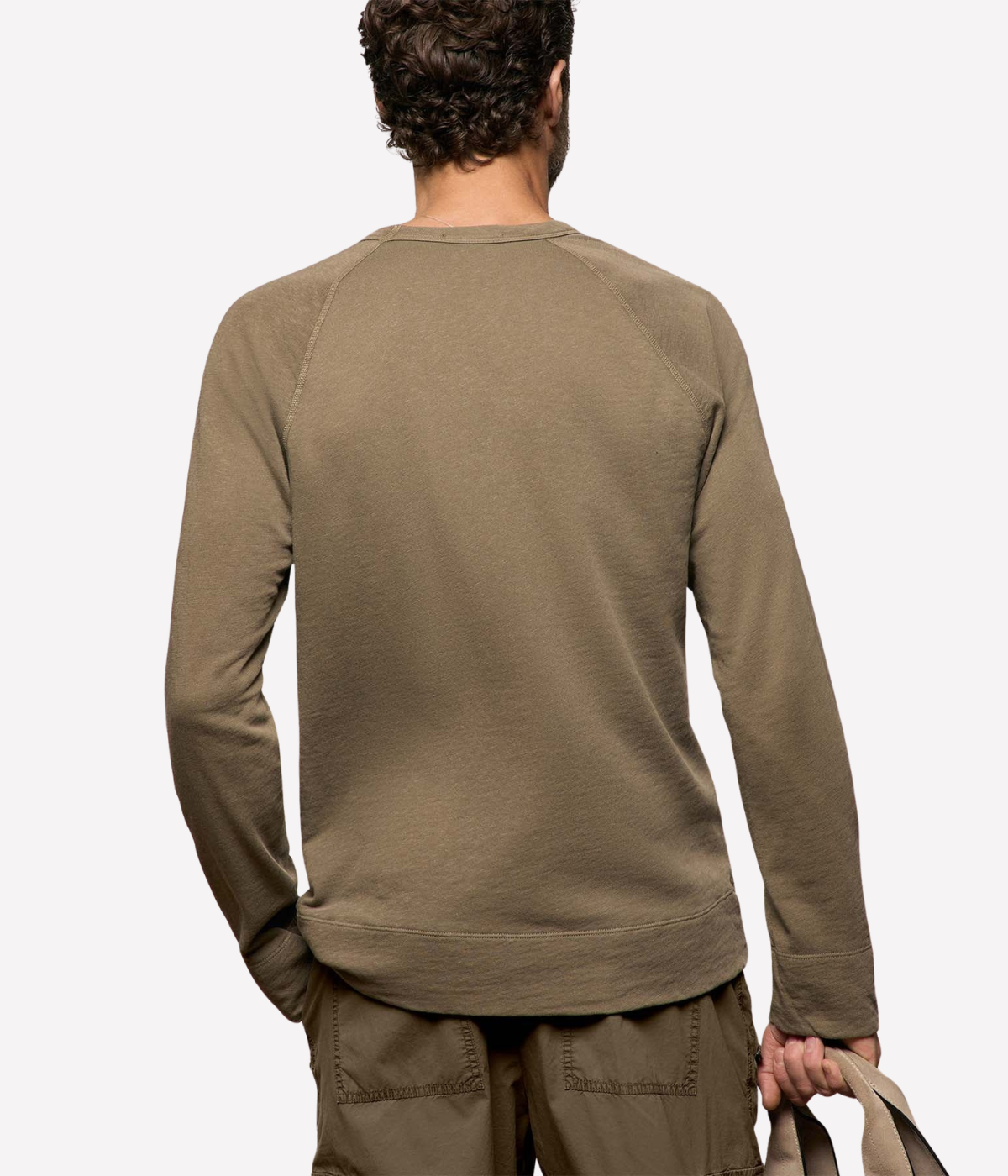 James Perse Vintage French Terry Sweatshirt in Light Olive Pigment – upper back view on model showcasing raglan seam detailing and relaxed silhouette.
