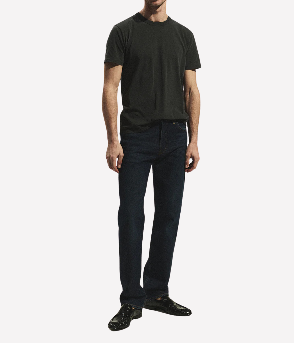 Full-length front view of model wearing Citizens of Humanity Elijah in Dark Indigo