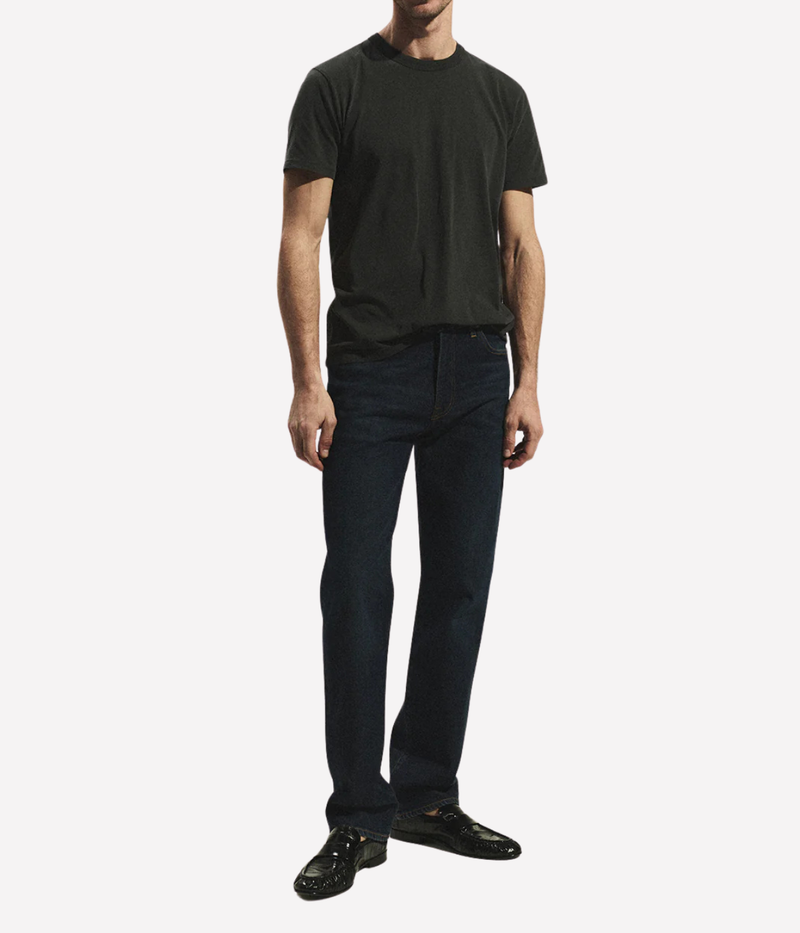 Full-length front view of model wearing Citizens of Humanity Elijah in Dark Indigo
