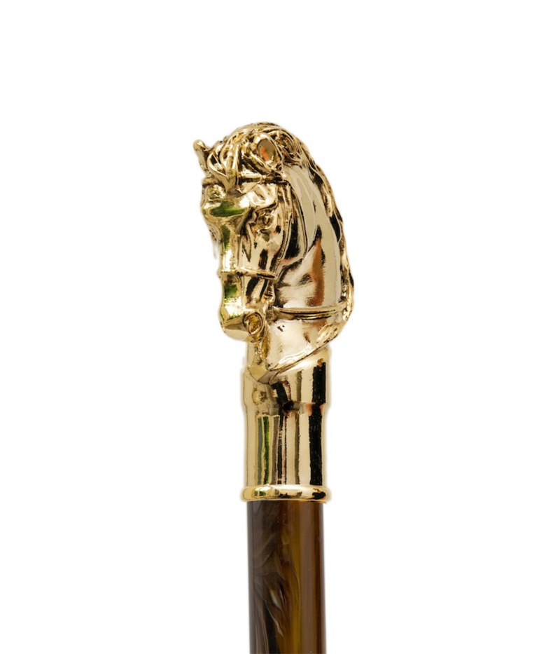 Pasotti Cavallo Gold Shoehorn in Perlato Moro - Gold horse closeup shot