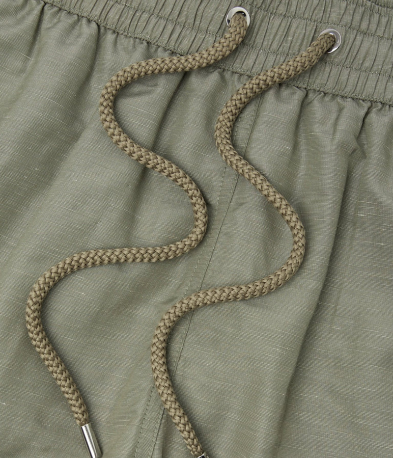 Frescobol Carioca Rio Linen Blend Swim Short in Palm Green – Close Up View on  Drawstring Swim Shorts