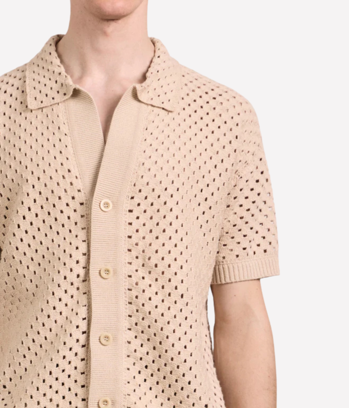 Frescobol Carioca Pinto Cotton Crochet Cardigan in Sand featuring an open crochet knit, open collar and button-front fastening - Closeup Shot on Shoulder Line