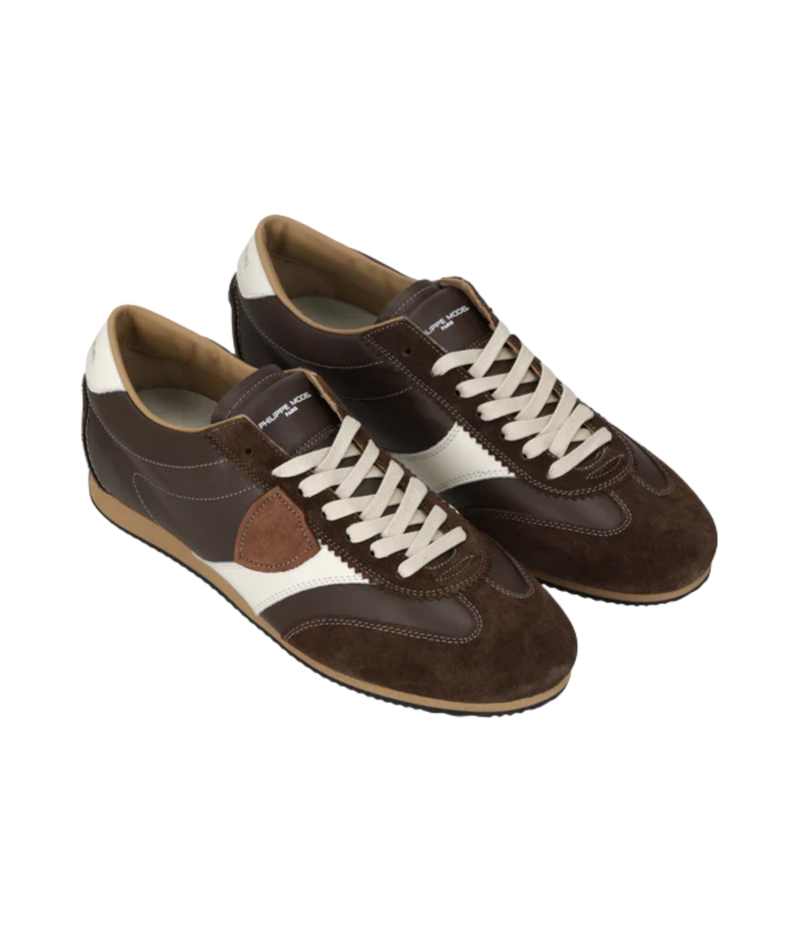 Philippe Model Planche Low Man in Veau Daim Marron angled side view in pair featuring leather upper, suede inserts and embossed shield