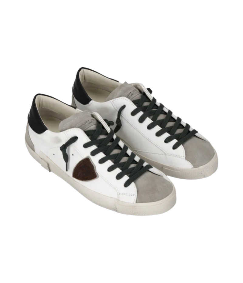 Philippe Model Prsx Low Man in Vintage Mixage Blanc Noir angled side view in pair featuring leather and suede upper with signature shield