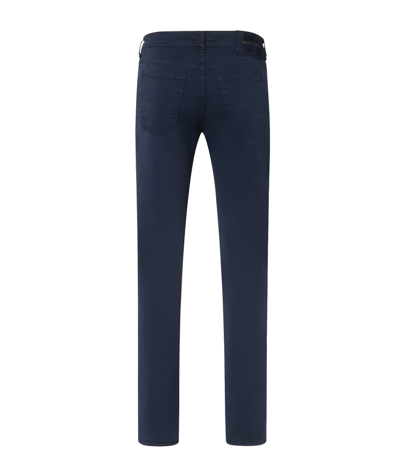 A pair of dark navy blue slim-fit jeans shown from the back, featuring a standard five-pocket design and belt loops, photographed on a solid white background.