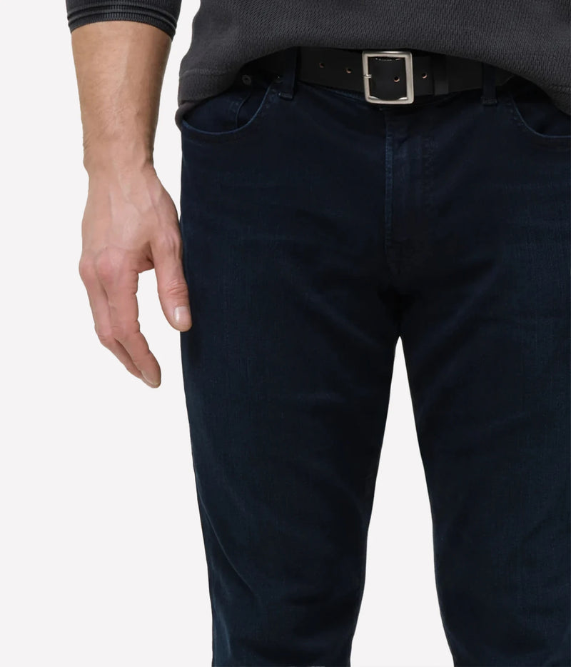 Close-up of Citizens of Humanity London Tapered Slim Perform Jean in Hyde showing the waist and dark indigo wash.