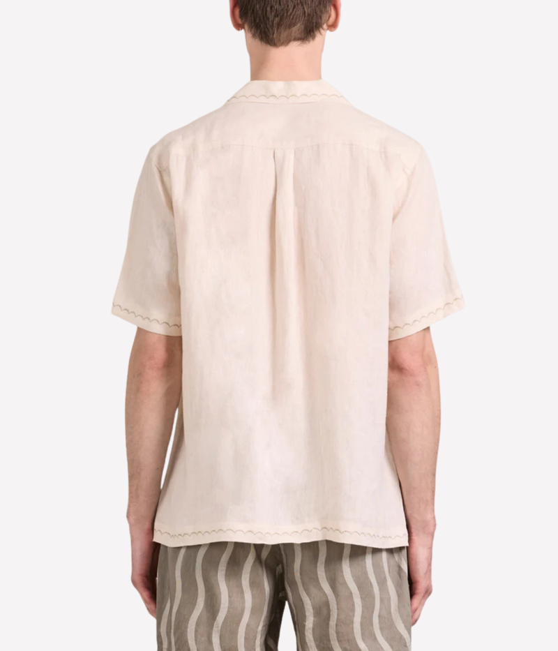 Frescobol Carioca Alves Palm Embroidered Linen Short Sleeve Shirt in Cream featuring seasonal palm embroidery, a camp collar and chest pocket - Back View on Model