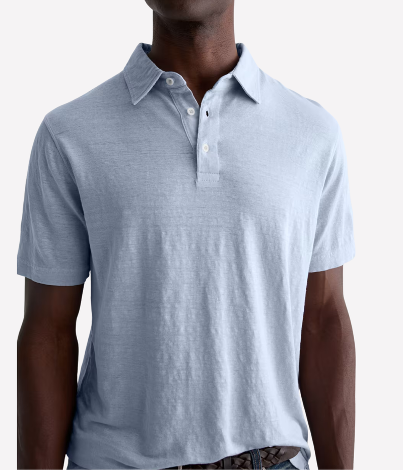 AG Bryce Short Sleeve Polo in Fresh Blue worn on model front view.