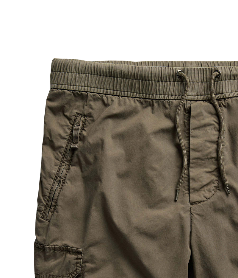 James Perse Supima Poplin Cargo Shirt in Light Olive Pigment – close-up of the elasticated drawstring waistband showcasing adjustable fit, utility styling, and lightweight stretch poplin fabric.