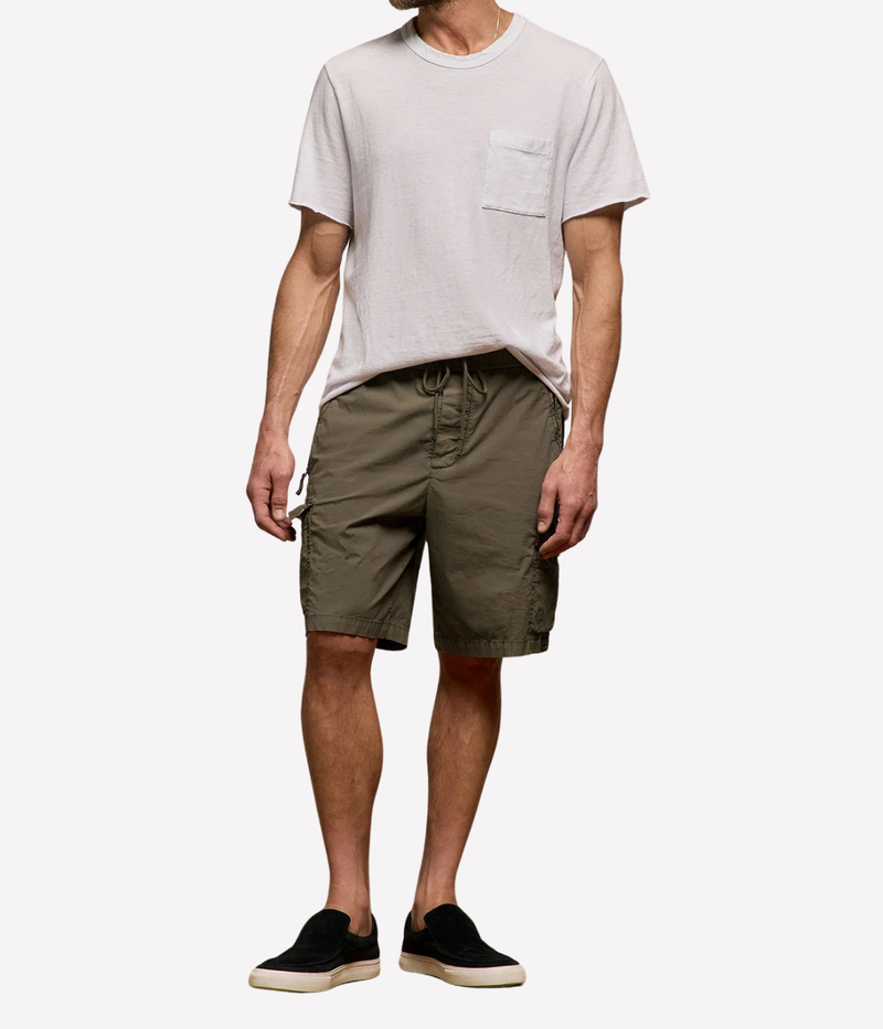 James Perse Supima Poplin Cargo Shirt in Light Olive Pigment – full-length front view on model showcasing relaxed fit, lightweight stretch poplin, and cargo-style detailing.