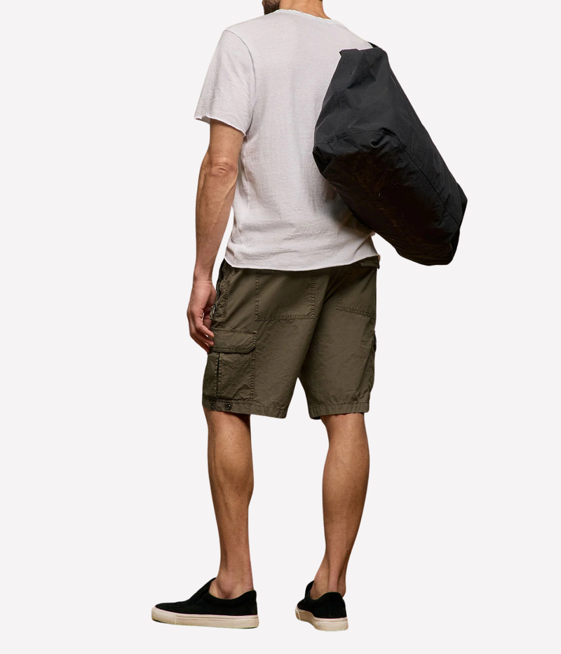 James Perse Supima Poplin Cargo Shirt in Light Olive Pigment – back view on model showcasing clean shirt construction and relaxed fit.