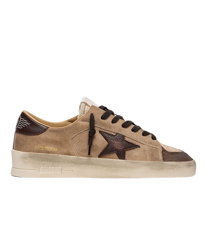 Golden Goose Stardan low-top sneakers in beige, brown and white with a suede upper, nylon tongue and leather star, side profile.