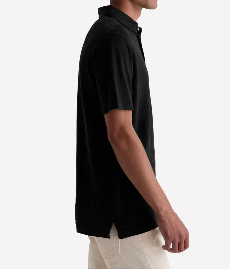 AG Bryce Short Sleeve Polo in True Black worn on model - side view. 