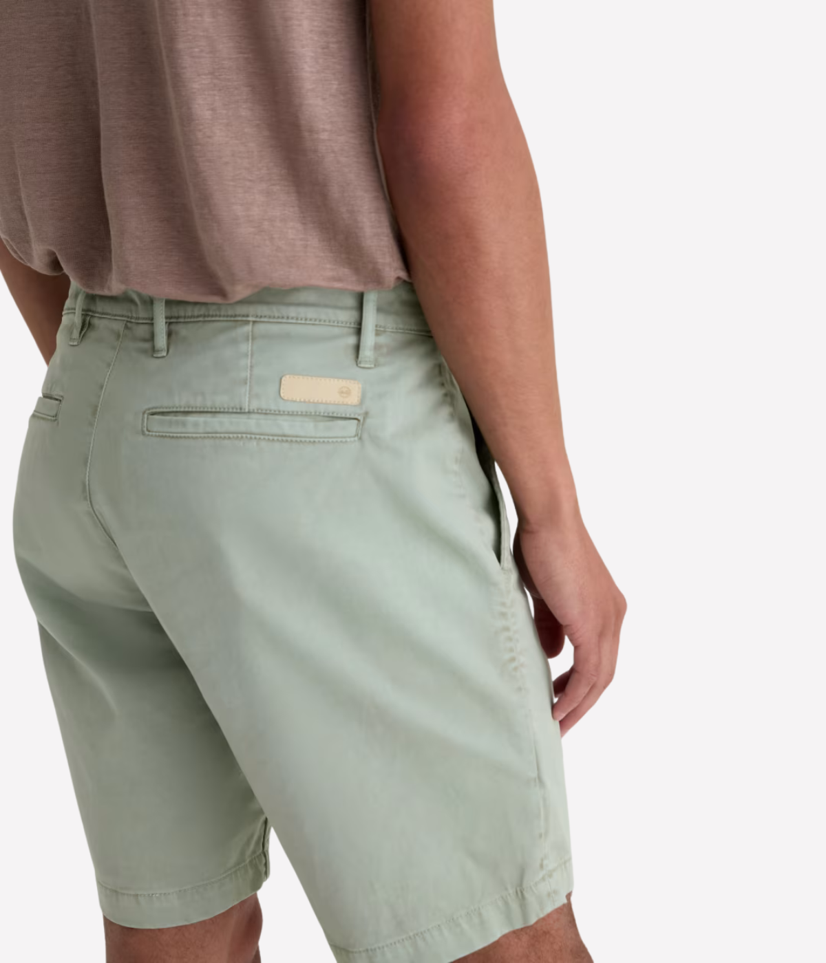 AG Wanderer Short in Sulfur Faded Moss worn on model - angled back view