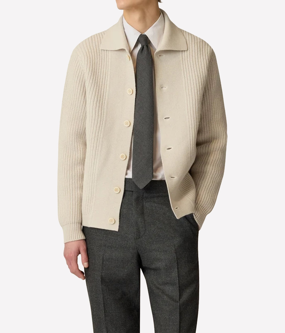 Man wearing Lardini Wool Cashmere Knit Cardigan in Cream over a shirt and dark tie with charcoal trousers, front view