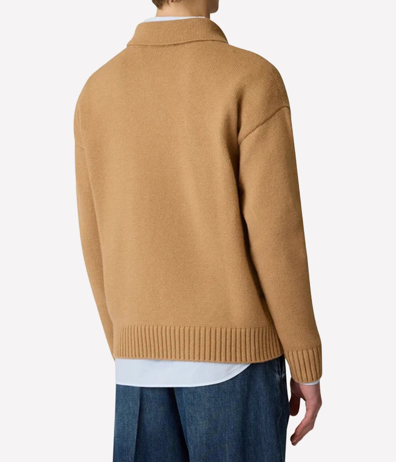 Man wearing Lardini Wool Cashmere Knit Polo in Beige with blue jeans, back view