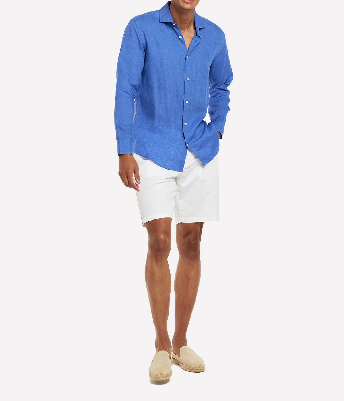 Model wearing the Antonio Long Sleeve Linen Shirt by Frescobol Carioca, showcasing the refined tailoring and premium 100% Italian linen fabric. The structured dress collar, long sleeves, and imitation mother of pearl buttons make this shirt a sophisticated choice for formal or relaxed occasions.