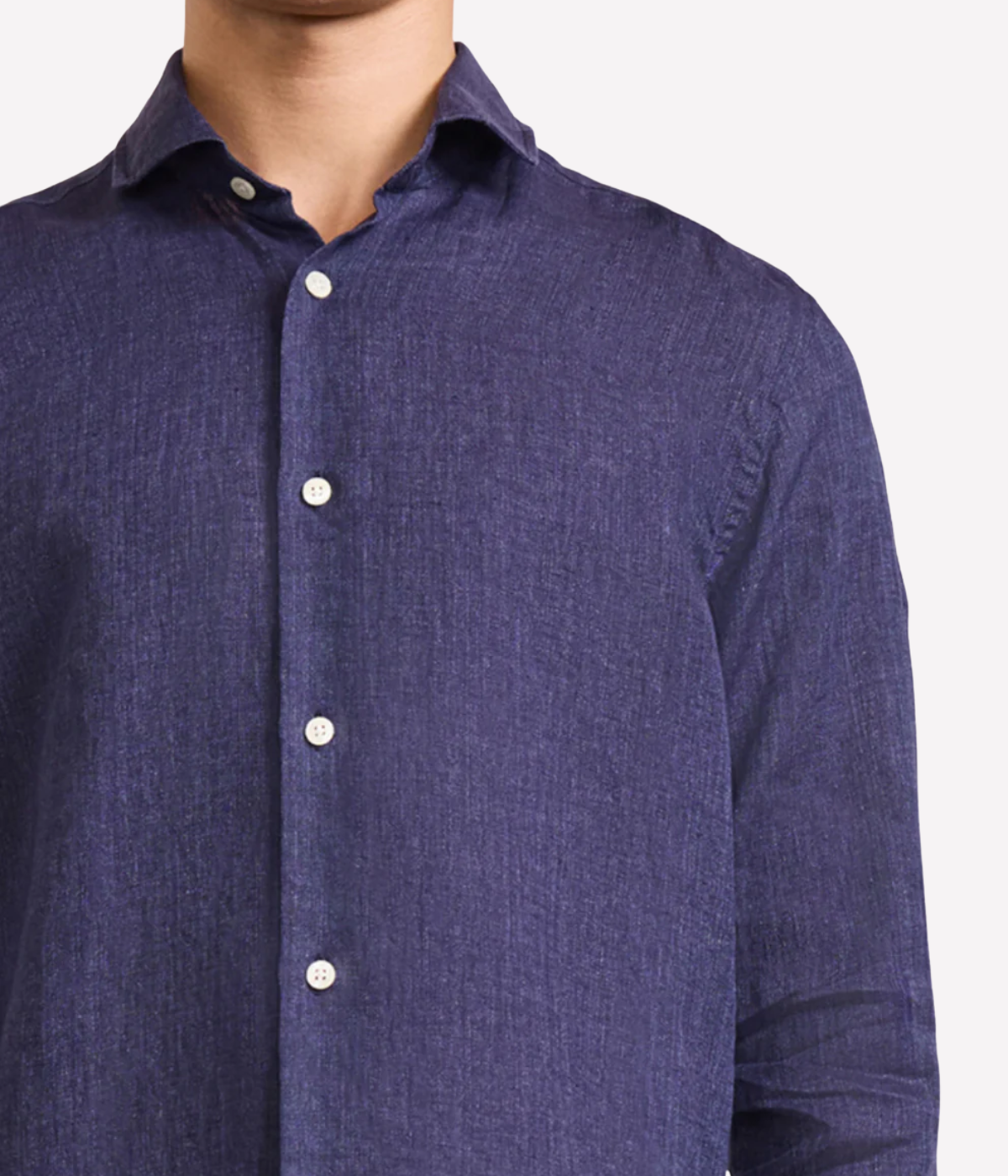 The Antonio Long Sleeve Linen Shirt by Frescobol Carioca, floating to emphasize its structured dress collar with stiffeners, imitation mother of pearl buttons, and full placket. The lightweight Italian linen construction ensures breathable comfort and elevated style for versatile occasion dressing.