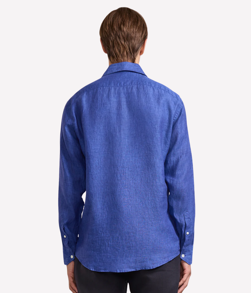 The Antonio Long Sleeve Linen Shirt by Frescobol Carioca, floating to emphasize its structured dress collar with stiffeners, imitation mother of pearl buttons, and full placket. The lightweight Italian linen construction ensures breathable comfort and elevated style for versatile occasion dressing.