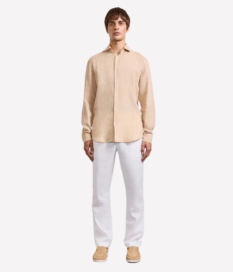 the Antonio Long Sleeve Linen Shirt by Frescobol Carioca, floating to emphasize its structured dress collar with stiffeners, imitation mother of pearl buttons, and full placket. The lightweight Italian linen construction ensures breathable comfort and elevated style for versatile occasion dressing
