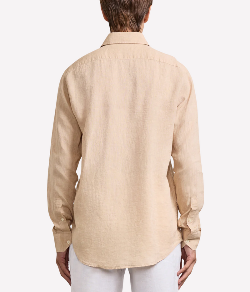 the Antonio Long Sleeve Linen Shirt by Frescobol Carioca, floating to emphasize its structured dress collar with stiffeners, imitation mother of pearl buttons, and full placket. The lightweight Italian linen construction ensures breathable comfort and elevated style for versatile occasion dressing