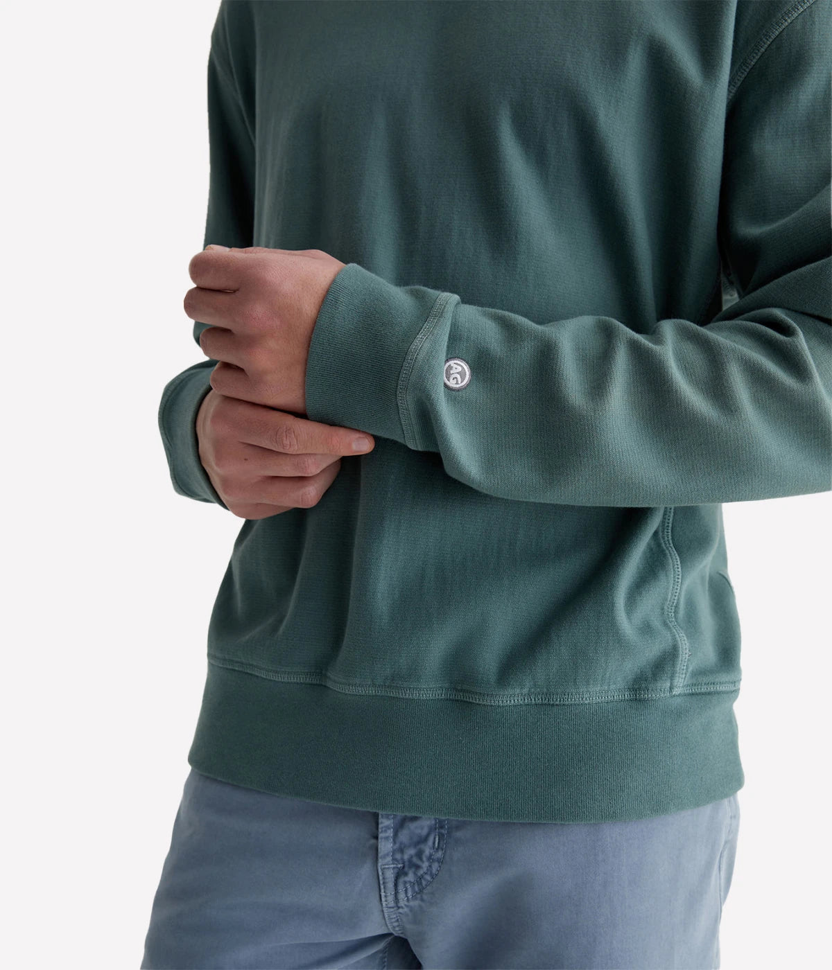 Arc Panelled Sweatshirt in relaxed fit, made from 100% cotton Essential Luxe Terry, featuring sulfur-dyed faded green colour, ribbed side panels, and overlock stitching