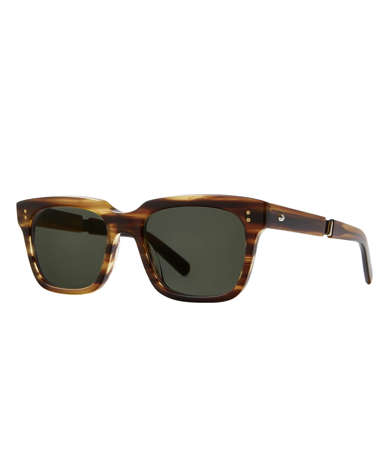 A modern take on a country club classic, the Arnie sunglasses by Mr Light feature a sleek acetate frame with titanium components and intricate filigree at the temples. Handcrafted in Japan with optical-quality CR39 lenses for superior clarity and UV protection.