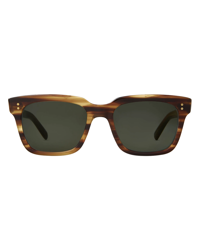 A modern take on a country club classic, the Arnie sunglasses by Mr Light feature a sleek acetate frame with titanium components and intricate filigree at the temples. Handcrafted in Japan with optical-quality CR39 lenses for superior clarity and UV protection.