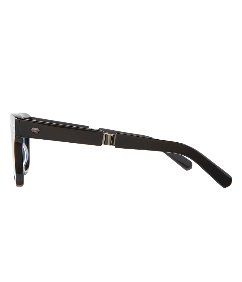 A modern take on a country club classic, the Arnie sunglasses by Mr Light feature a sleek acetate frame with titanium components and intricate filigree at the temples. Handcrafted in Japan with optical-quality CR39 lenses for superior clarity and UV protection.